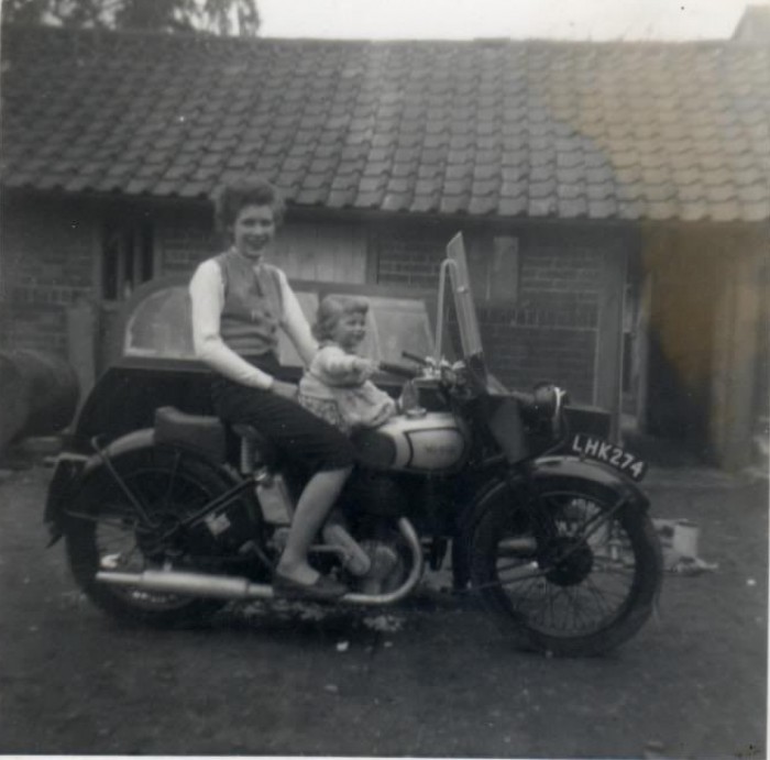 Mum and my sister on Dads Norton 16h mid 1950s