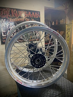 Husqvarna wheels built with excel anodised silver