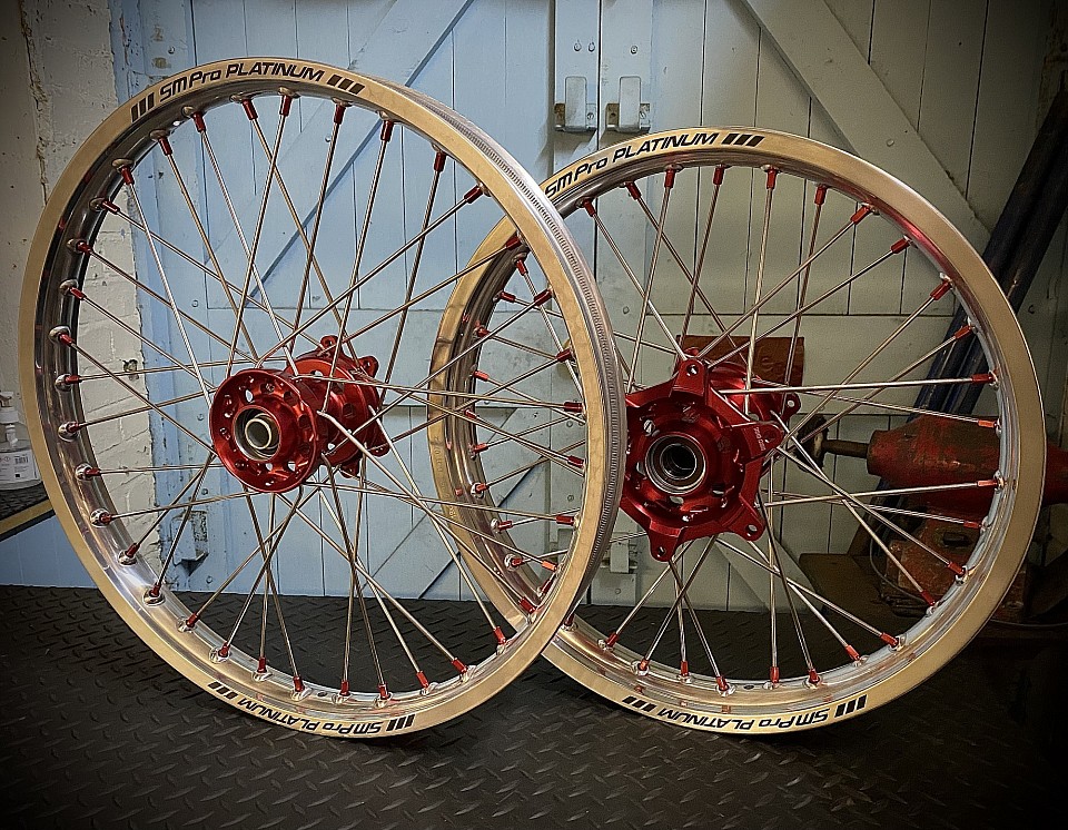 SM PRO any colours, customer chose silver rims, stainless spokes, red nipples, and a red hub for his cr250